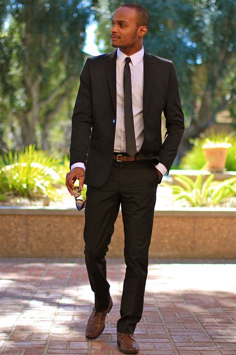 tan shoes with black suit.